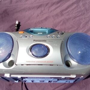 Panasonic Silver Boombox with Blue Speaker Grilles and Teal Display